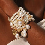Opulent Pearl Cluster Bracelet with Textured Gold Details
